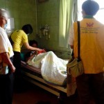 Relief team visiting an injured person at Dadong Hospital