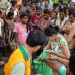 Distributing relief items at Bundapani Tea Garden