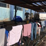 A temporary home of refugees at the port in Lesbos, Greece – November 16, 2015
