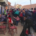 Miratovac, Serbia – Refugees stop to eat, rest, and gathering supplies and information before continuing