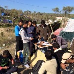 Solar panel phone charging station at Camp Moria in Lesbos, Greece – November 2015