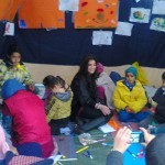 Shah, an Iranian volunteer from London, in Moria's camp at the new children's art place. November 30, 2015