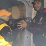 Distributing sleeping bags on a cold night - December 7, 2015