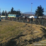 Refugees waiting in line to receive food in Idomeni, Greece- December 8, 2015