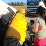 Distributing gloves, hats and socks to refugees in Idomeni, Greece - December 8, 2015
