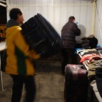Providing warm clothes and shoes at the train station in Tabanovce, Macedonia – December 3, 2015