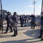 Police officers helping to provide security at the refugee camp in Idomeni, Greece - December 4, 2015