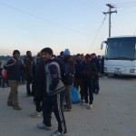 Refugees arriving by bus to Idomeni, Greece - December 4, 2015