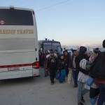 Refugees arriving by bus to Idomeni, Greece - December 4, 2015