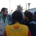 Talking with other volunteers providing help to the refugees in Idomeni, Greece - December 5, 2015