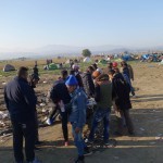 Refugees charging mobile phone in Idomeni, Greece - December 6, 2015