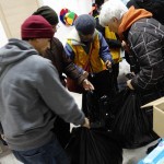 Our association members give warm clothes to local group helping the refugees in Kavalas, Greece - December 9, 2015