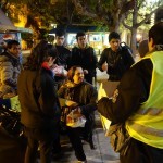 20151212 refugees are blissful happy to receive our foods and flyer at midnight at Victory Park in Athens Greece (6)