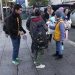 20151214 around 8AM refugees are blissful happy to receive our foods and flyer at Victory Park in Athens Greece (24)