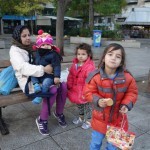 20151214 around 8AM refugees are blissful happy to receive our foods and flyer at Victory Park in Athens Greece (3)