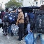 20151214 around 8AM refugees are blissful happy to receive our foods and flyer at Victory Park in Athens Greece (36)