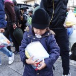 20151214 around 8AM refugees are blissful happy to receive our foods and flyer at Victory Park in Athens Greece (39)