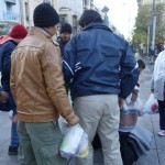 20151214 around 8AM refugees are blissful happy to receive our foods and flyer at Victory Park in Athens Greece (49)
