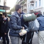 20151214 around 8AM refugees are blissful happy to receive our foods and flyer at Victory Park in Athens Greece (51)