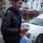 20151214 around 8AM refugees are blissful happy to receive our foods and flyer at Victory Park in Athens Greece (53)