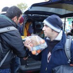 20151214 around 8AM refugees are blissful happy to receive our foods and flyer at Victory Park in Athens Greece (55)