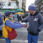 20151214 around 8AM refugees are blissful happy to receive our foods and flyer at Victory Park in Athens Greece (62)