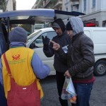 20151214 around 8AM refugees are blissful happy to receive our foods and flyer at Victory Park in Athens Greece (7)