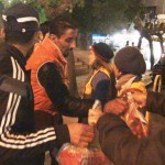 20151214 around 8PM refugees are blissful happy to receive our foods and flyer at Victory Park in Athens Greece (1)-b