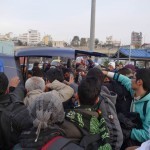 20151215 around 8AM refugees are blissful happy to receive our foods and flyer at Pireaus harbor in Athens Greece (13)