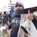 20151215 around 8AM refugees are blissful happy to receive our foods and flyer at Pireaus harbor in Athens Greece (25)