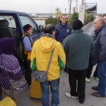 20151215 around 8AM refugees are blissful happy to receive our foods and flyer at Pireaus harbor in Athens Greece (6)