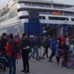 20151215 around 8AM refugees are blissful happy to receive our foods and flyer at Pireaus harbor in Athens Greece (77)
