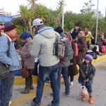 20151215 around 8AM refugees are blissful happy to receive our foods and flyer at Pireaus harbor in Athens Greece (82)