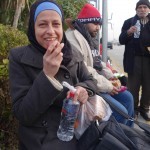 20151215 around 8AM refugees are blissful happy to receive our foods and flyer at Pireaus harbor in Athens Greece (85)