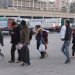 20151215 around 8AM refugees are blissful happy to receive our foods and flyer at Pireaus harbor in Athens Greece (91)
