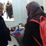 20151215 local people providing food warm clothes etc to refugees at Pireaus harbor in Athens Greece (2)