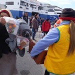 20151217 around 10AM refugees are blissful happy to receive our foods and flyers at Pireaus harbor in Athens Greece (101)