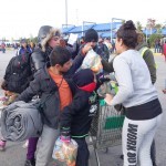 20151217 around 10AM refugees are blissful happy to receive our foods and flyers at Pireaus harbor in Athens Greece (110)