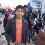 20151217 around 10AM refugees are blissful happy to receive our foods and flyers at Pireaus harbor in Athens Greece (117)