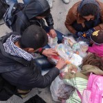 20151217 around 10AM refugees are blissful happy to receive our foods and flyers at Pireaus harbor in Athens Greece (119)