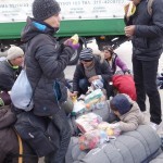 20151217 around 10AM refugees are blissful happy to receive our foods and flyers at Pireaus harbor in Athens Greece (120)