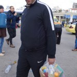 20151217 around 10AM refugees are blissful happy to receive our foods and flyers at Pireaus harbor in Athens Greece (124)