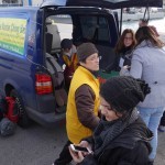 20151217 around 10AM refugees are blissful happy to receive our foods and flyers at Pireaus harbor in Athens Greece (133)