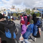 20151217 around 10AM refugees are blissful happy to receive our foods and flyers at Pireaus harbor in Athens Greece (137)