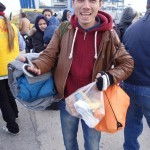 20151217 around 10AM refugees are blissful happy to receive our foods and flyers at Pireaus harbor in Athens Greece (145)