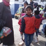 20151217 around 10AM refugees are blissful happy to receive our foods and flyers at Pireaus harbor in Athens Greece (154)