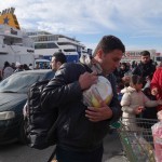 20151217 around 10AM refugees are blissful happy to receive our foods and flyers at Pireaus harbor in Athens Greece (20)