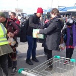 20151217 around 10AM refugees are blissful happy to receive our foods and flyers at Pireaus harbor in Athens Greece (24)