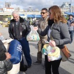 20151217 around 10AM refugees are blissful happy to receive our foods and flyers at Pireaus harbor in Athens Greece (25)