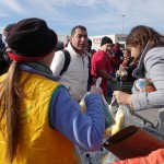 20151217 around 10AM refugees are blissful happy to receive our foods and flyers at Pireaus harbor in Athens Greece (26)
